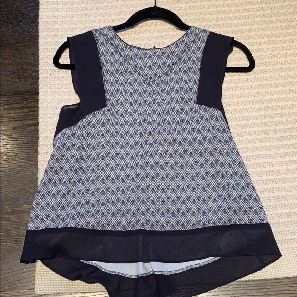 Sleeveless peplum top